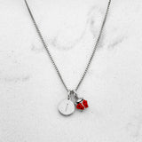 Collana coccinella e charm lettera in argento 925